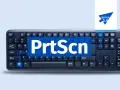 Klawiatura z napisem "PrtScn" na środku. Dowiedz się, jak zrobić zrzut ekranu na komputerze.