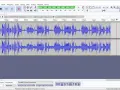 Audacity - program do nagrywania dźwięku, pokazuje dwie ścieżki audio z falami dźwiękowymi.
