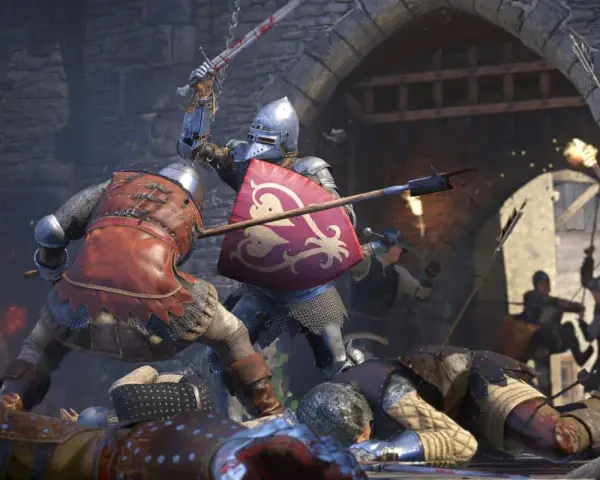 Zacięta bitwa w Kingdom Come: Deliverance. Rycerze w zbrojach walczą mieczami i tarczami, wokół leżą pokonani. Kody do gry mogą pomóc w tej brutalnej walce.