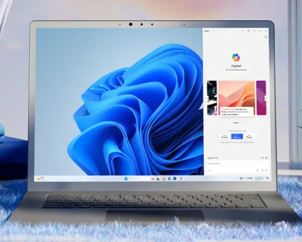Nowoczesny laptop z oknem Copilot, który może pomóc w optymalizacji komputera.
