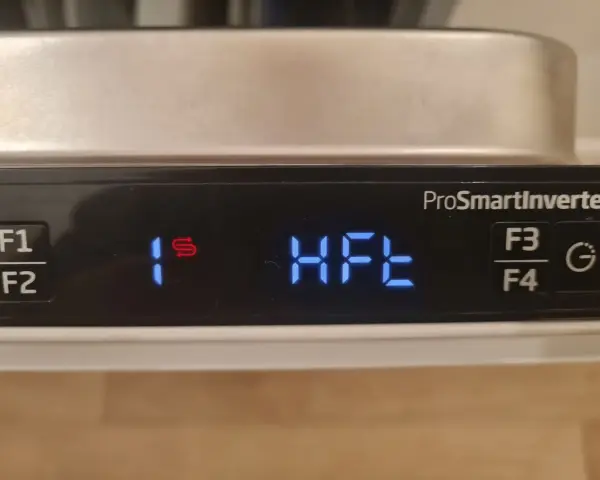 Panel zmywarki Beko: przyciski F1, F2, F3, F4, symbol "1s" i napis "HFE".