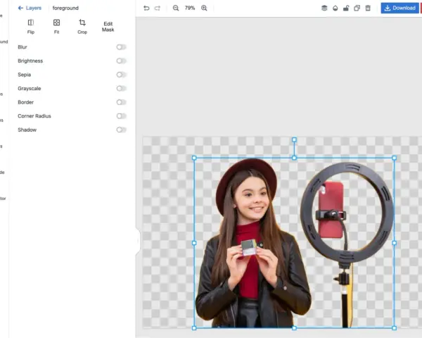 Dziewczynka z ring light i telefonem, gotowa do nagrania. Aplikacja do usuwania tła pozwala na edycję warstw.