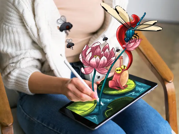 Osoba rysuje na tablecie za pomocą rysika, tworząc kolorowy świat z żabą, ważką i kwiatami. Świetne aplikacje do rysowania na tablecie ożywiają wyobraźnię.
