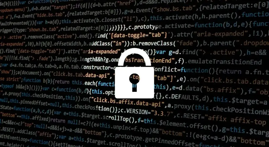 Zapomniałem hasła do laptopa. Widzę kod i ikonę kłódki, symbolizującą bezpieczeństwo i potencjalne problemy z dostępem.