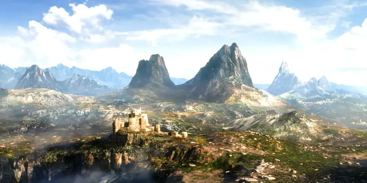 Majestatyczny krajobraz z zamkiem na wzg&oacute;rzu i skalistymi szczytami w tle, zapowiadający przygodę w The Elder Scrolls 6.
